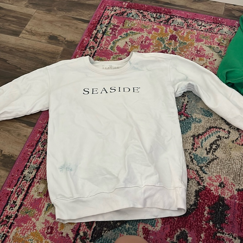 Some blue stains from the washer, good quality, so comfy